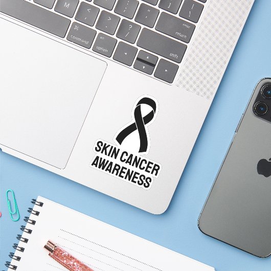 Zwarte lint voor huidkanker sticker (Laptop met iPhone)