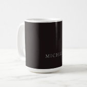Zwarte minimalistische eigen naam koffiemok (Voorkant links)