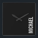 Zwarte Moderne Minimalistische Gepersonaliseerde N Vierkante Klok<br><div class="desc">Modern minimalistisch ontwerp met een gepersonaliseerde naam in wit, modern, sans serif lettertype stijl op zwarte achtergrond.</div>