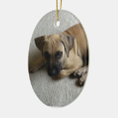 Zwarte-mondkapper met blauwe speelgoed keramisch ornament (Links)