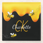 Zwarte monogram met honing die druppelt in goud glazen onderzetter (Voorkant)