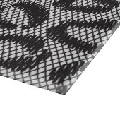 Zwarte netzijde met luipaard op wit snijplank (Hoek)