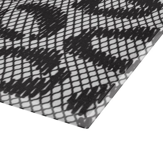 Zwarte netzijde met luipaard op wit snijplank (Hoek)