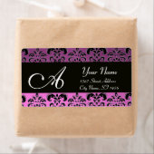 ZWARTE PAARSE DAMASKMONOGRAM ETIKET (Insitu)