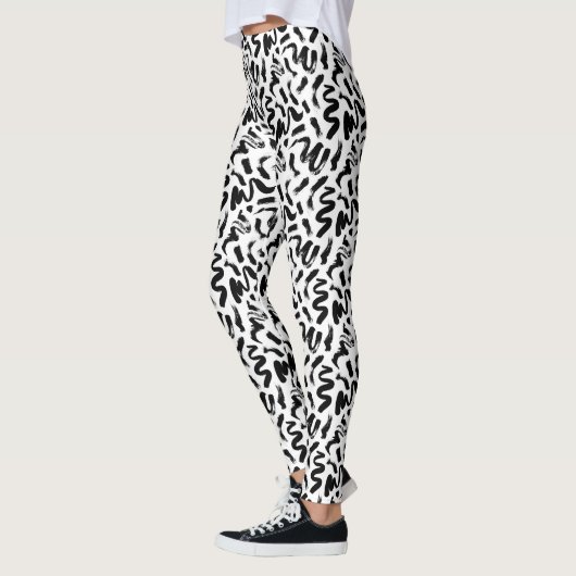 Zwarte penseelstreekpatroon van inktverf leggings (Links)