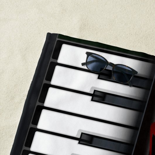 Zwarte piano met wit toetsenbord strandlaken (In situ)