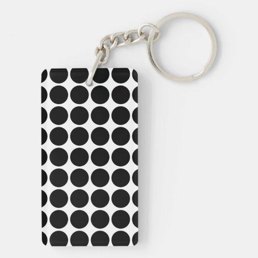 Zwarte poladots op wit sleutelhanger (achterkant)
