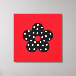 Zwarte polka dot bloem op rode achtergrond canvas afdruk