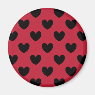 Zwarte polka harten op rood magneet