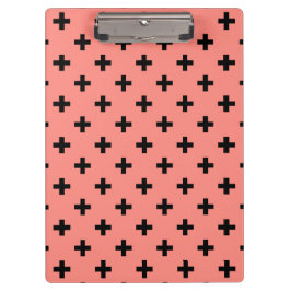 Zwarte polka kruist op perziken klembord