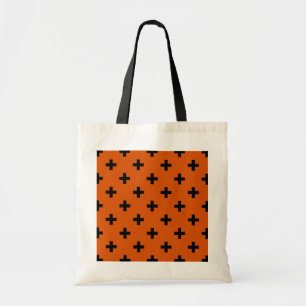 Zwarte polka kruist op sinaasappel tote bag