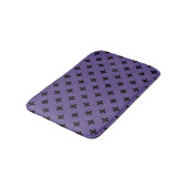 Zwarte polka kruist op ultraviolet badmat (Gekanteld)