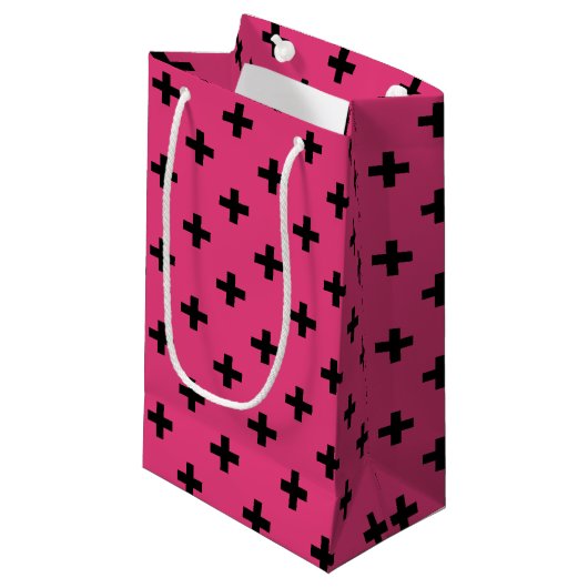 Zwarte polka kruist over fuchsia klein cadeauzakje (Voorkant Gekanteld)