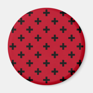 Zwarte polka kruist rood magneet