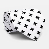 Zwarte polka kruist wit stropdas (Opgerold)