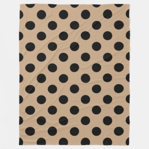 Zwarte polka-punten op beige fleece deken