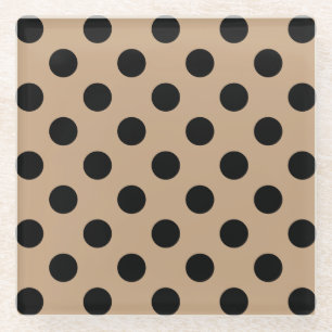 Zwarte polka-punten op beige glazen onderzetter