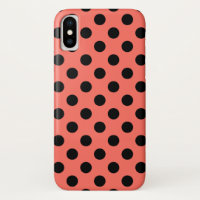 Zwarte polka-punten op levend koraal