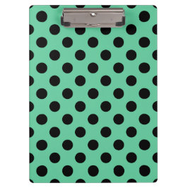 Zwarte polka-punten op muntgroen klembord