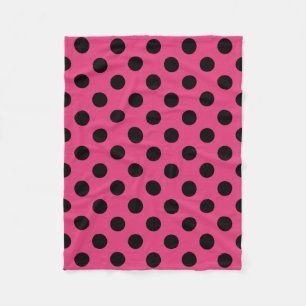 Zwarte polka stippen op fuchsia fleece deken