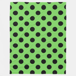 Zwarte polka-stippen op kalkgroen fleece deken