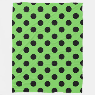 Zwarte polka-stippen op kalkgroen fleece deken
