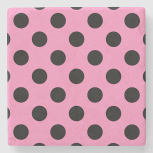 Zwarte polka-stippen op roze stenen onderzetter