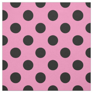 Zwarte polka-stippen op roze stof