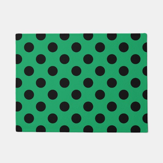 Zwarte polka-stippen op vers groen deurmat (Voorkant)