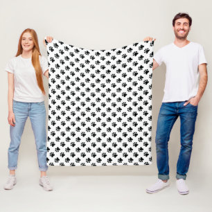 Zwarte pootpatroon op wit fleece deken