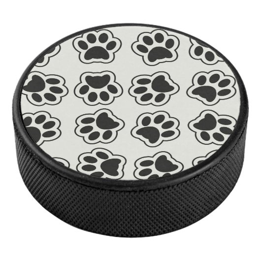 Zwarte poten, hondenpoten, kattenpoten, omtrek hockey puck (3/4)