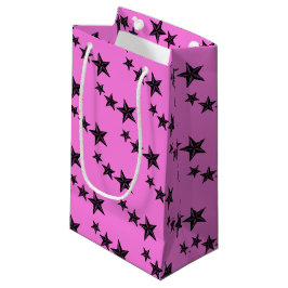 Zwarte retrosterren op roze klein cadeauzakje