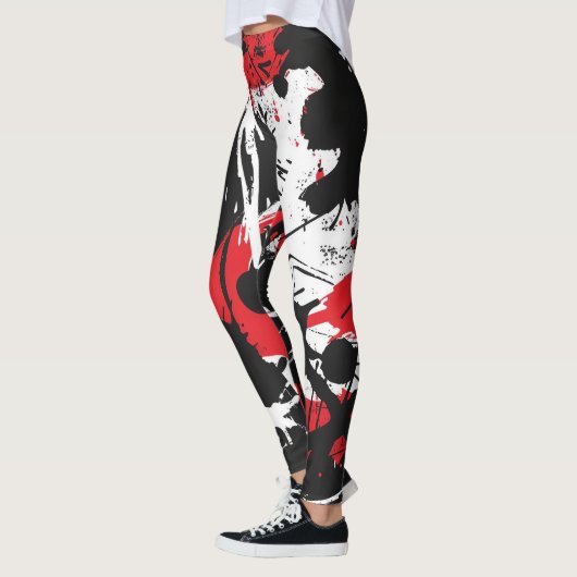 Zwarte, rode, witte abstracte kunst leggings (Links)