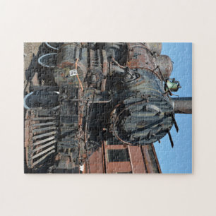 Zwarte Rusty Stoomlocomotief Treinmotor Legpuzzel