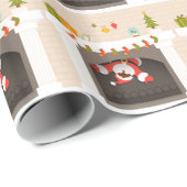zwarte santa zit vast in haard cadeaupapier (Rol Hoek)