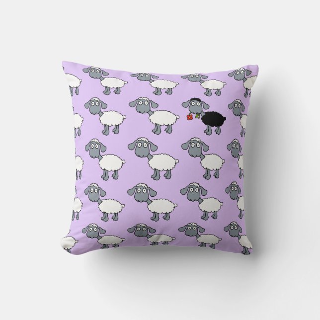 Zwarte schapenlamp met rode ventilator in witte ko kussen (Voorkant)