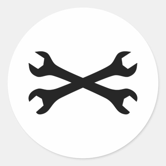 Zwarte schroefmoersleutel doorkruist ronde sticker (Voorkant)