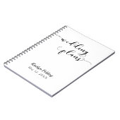 Zwarte scripttypografie trouwplanner op witte acht notitieboek (Linkerzijde)