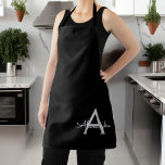 Zwarte Silver Modern Script Girly Monogram Naam Schort<br><div class="desc">Zwart en zilver monogram naam Apron. Dit maakt de perfecte liefhebbende 16 verjaardag,  bruiloft,  vrijgezellenfeest,  verjaardagsdag,  baby shower of vrijgezellenfeest voor iemand die van luxe glam en stijl houdt.</div>