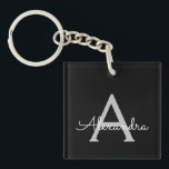 Zwarte Silver Modern Script Girly Monogram Naam Sleutelhanger<br><div class="desc">Zwart en zilver Eenvoudig Script Monogram Naam Sleutelhanger. Dit maakt het perfecte zoete 16-jarige verjaardagscadeau,  bruiloft,  vrijgezellenfeest,  jubileum,  baby shower of vrijgezellenfeest voor iemand die van glamoureuze luxe en chique stijlen houdt.</div>