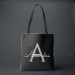 Zwarte Silver Modern Script Girly Monogram Naam Tote Bag<br><div class="desc">Zwart en Zilver Elegant Voeg je eigen naam Monogram Book Bag. Deze boekentas kan worden aangepast om uw initiaal en voornaam op te nemen en als cadeau te geven voor kerst,  lieve 16-verjaardag,  Vrijgezellenfeest of een bruiloft.</div>
