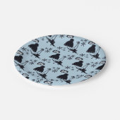 Zwarte ski-uitrusting & sneeuwvlokken op blauw papieren bordje (Gekanteld)