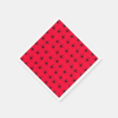 Zwarte spieren op rood servet (Hoek)