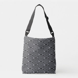Zwarte spiraalvormige cirkels op snel zilver grijs crossbody tas