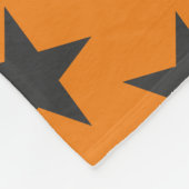 Zwarte sterren op pompoen fleece deken (Hoek)