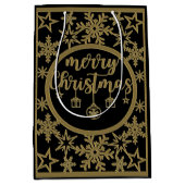 Zwarte tas met gouden kerstelementen medium cadeauzakje (Voorkant)