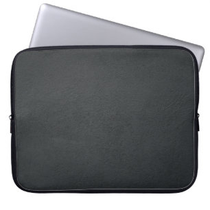 Zwarte textiel in close-up fotografie laptop sleeve