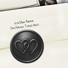 Zwarte trouwring met twee verstrengelde harten ronde sticker