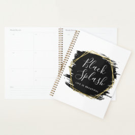 Zwarte verfstreek en moderne gouden geometrische c planner