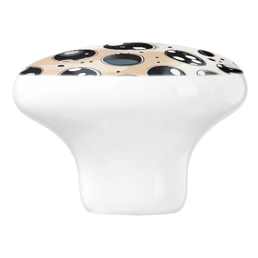 Zwarte vlekken en Stippen op Tan Keramische Knop (Zijkant)